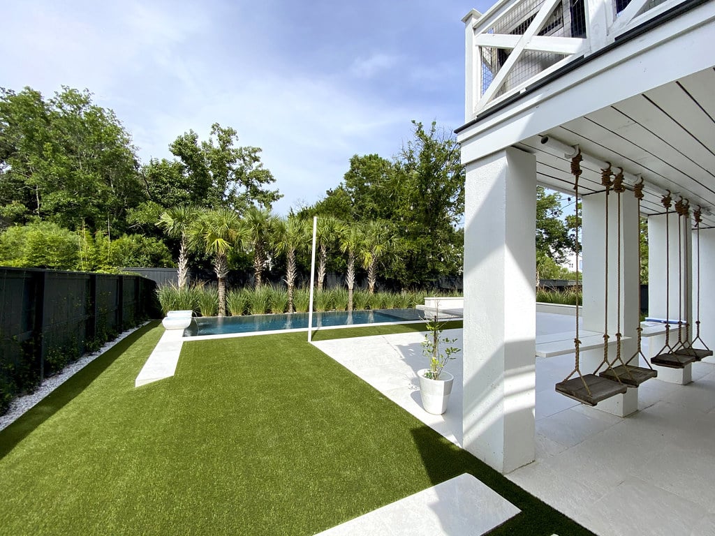 Backyard poolscape featuring ForeverLawn synthetic grass Corpus Christi, TX