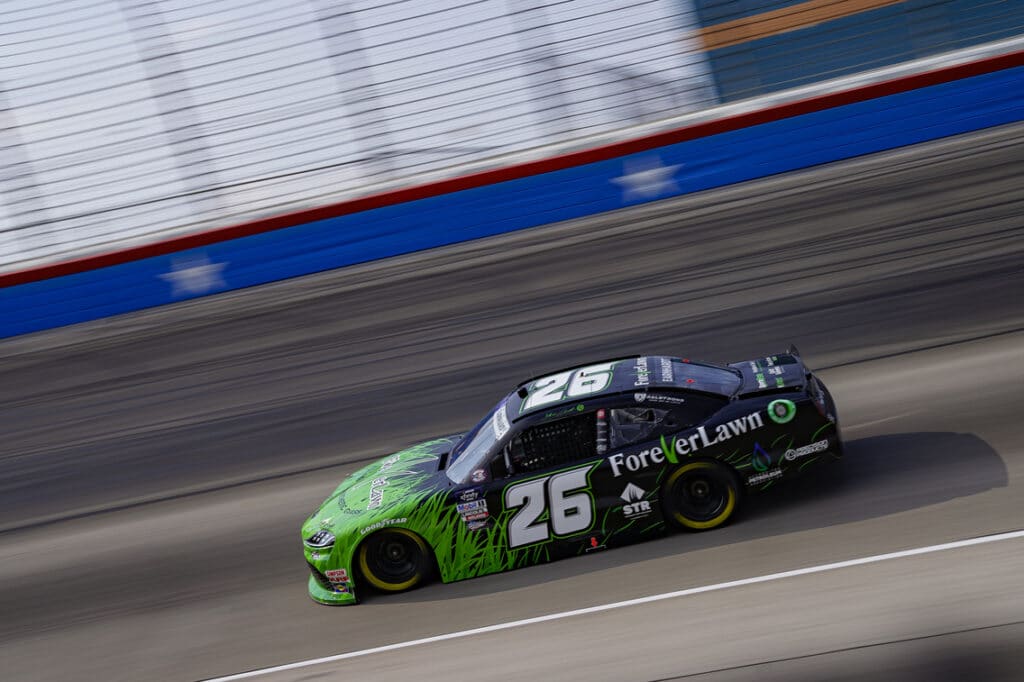 Earnhardt will pilot the No. 26 ForeverLawn Toyota GR Supra with a revamped version of the 2022 Black and Green Grass Machine paint scheme, as seen in Texas at the SRS Distribution 250.