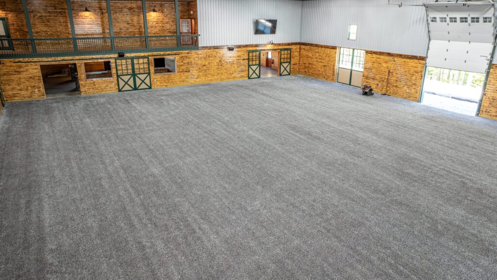 Indoor arena covered in horse turf